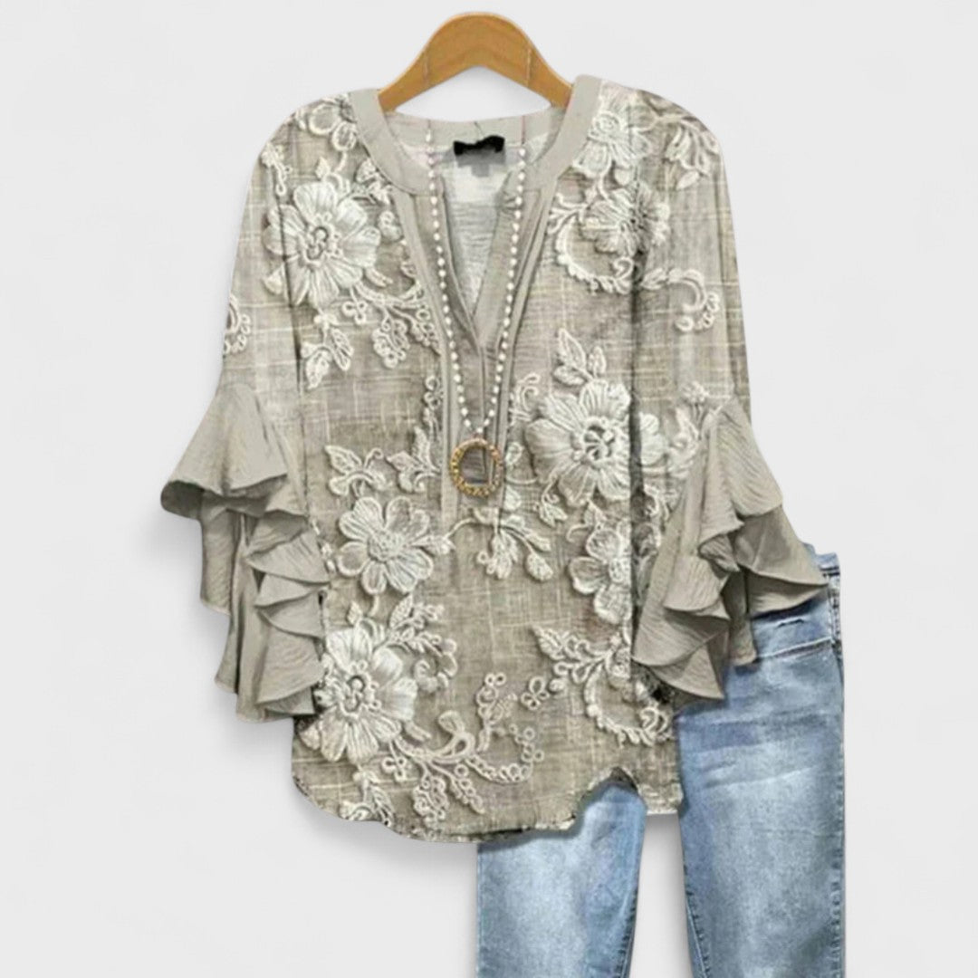 The BloomRuffle Elegance Blouse